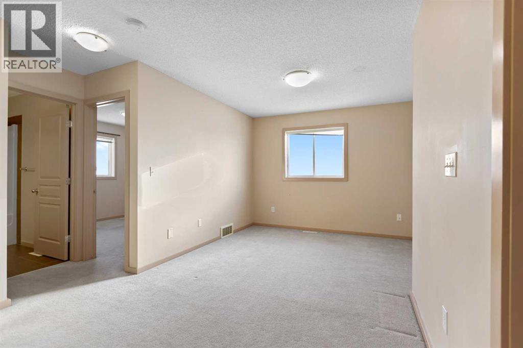 1083 Prairie Springs Hill Sw, Airdrie, Alberta  T4B 0E7 - Photo 17 - A2272902