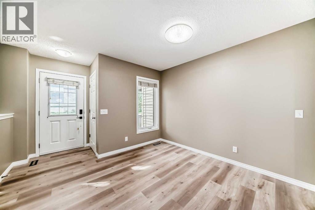 3019 Windsong Boulevard Sw, Airdrie, Alberta  T4B 0Y3 - Photo 4 - A2273047