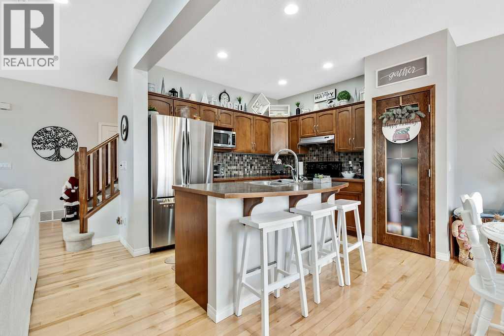 155 Cimarron Grove Circle, Okotoks, Alberta  T1S 2M1 - Photo 7 - A2274025