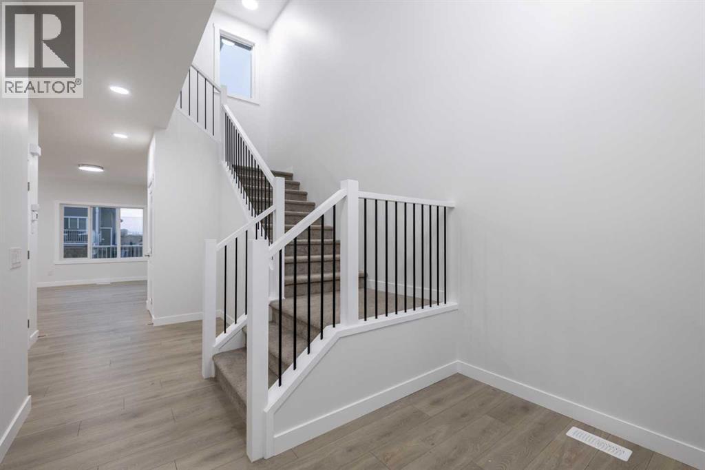 145 Sunstone Way, Balzac, Alberta  T4B 5T5 - Photo 4 - A2261463