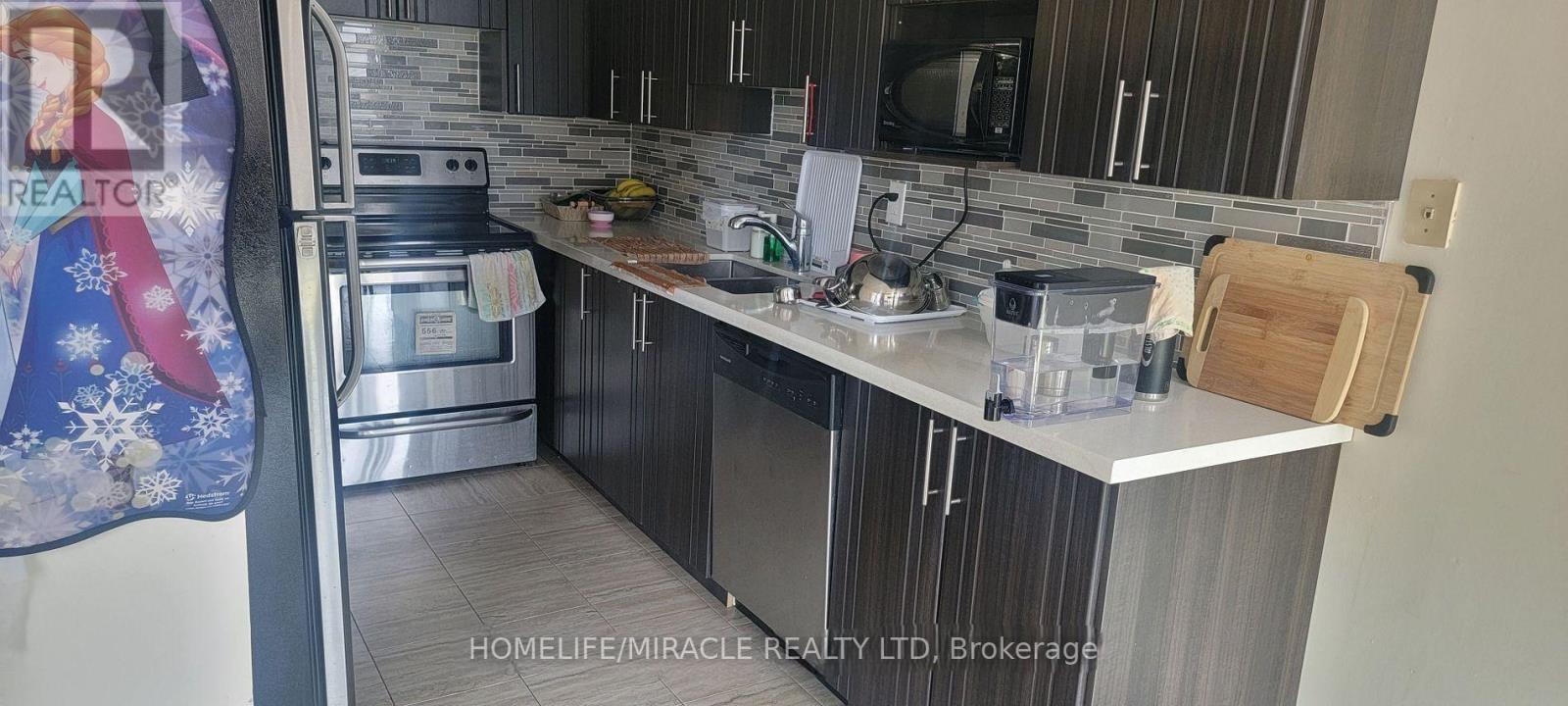 1407 - 10 Markbrook Lane, Toronto, Ontario  M9V 5E3 - Photo 4 - W12614246