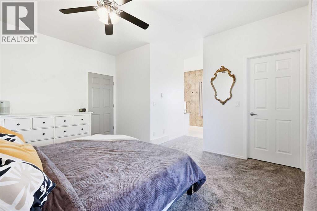 224 Sunterra Ridge Place, Cochrane, Alberta  T4C 1W9 - Photo 26 - A2274356