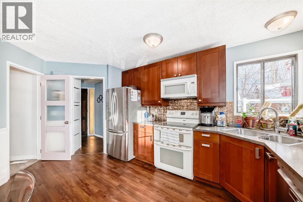 35 Macewan Drive Nw, Calgary, Alberta  T3K 3G1 - Photo 3 - A2274570