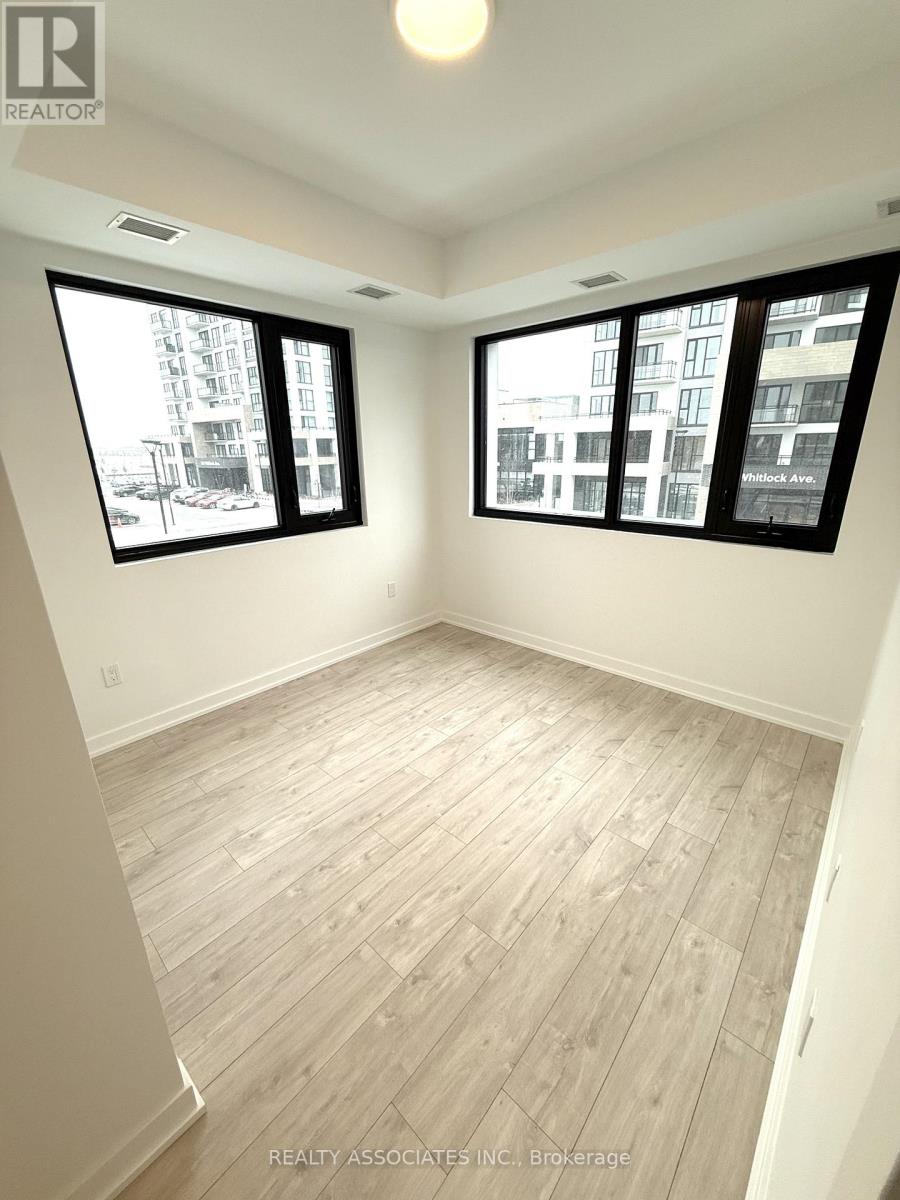 203 - 720 Whitlock Avenue, Milton, Ontario L9E 2B5 - Photo 5 - W12614542