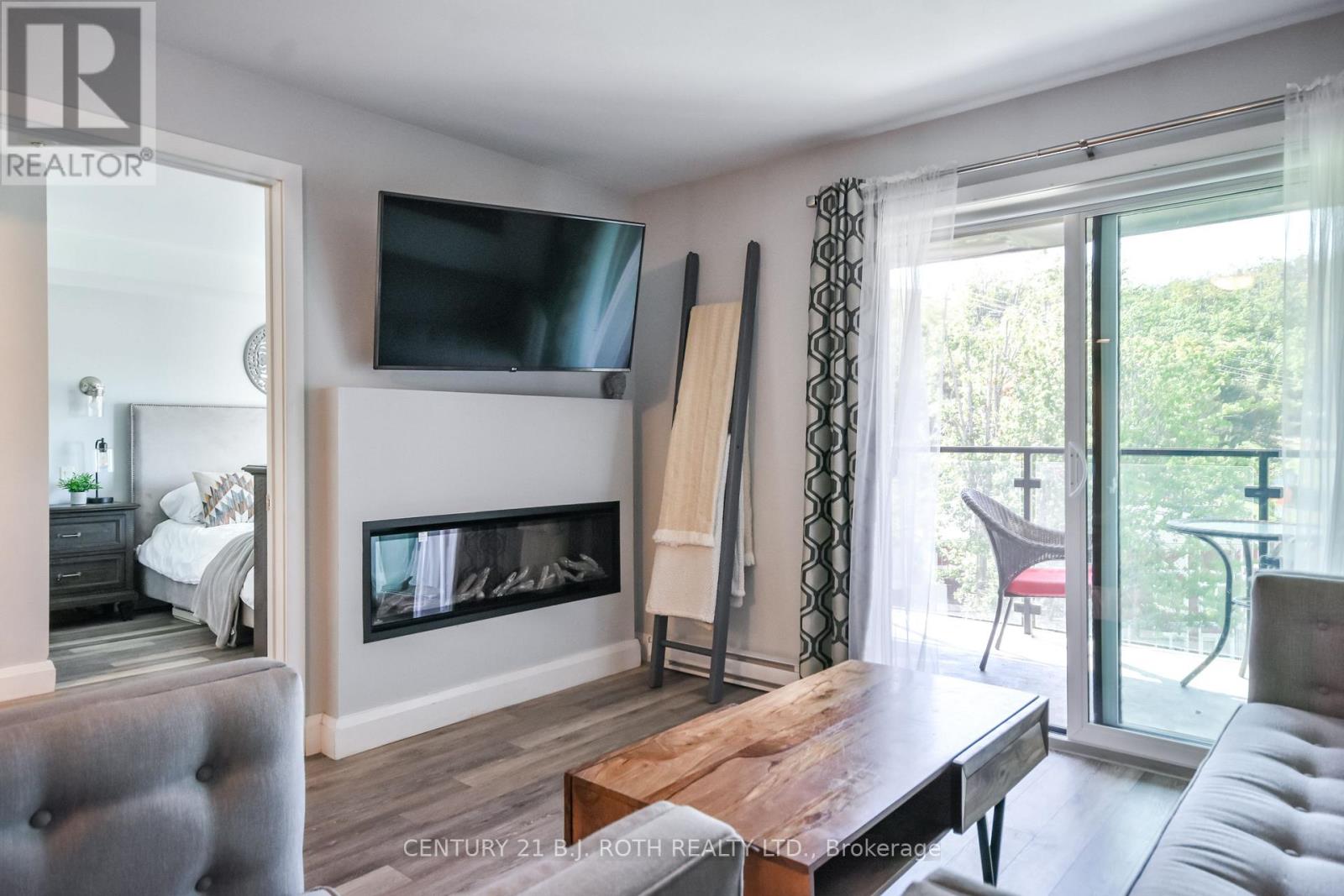 406 - 80 Horseshoe Boulevard, Oro-Medonte, Ontario L4M 4Y8 - Photo 6 - S12413134