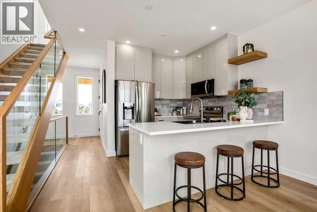 642 Cottageclub Bend, Rural Rocky View County, Alberta  T4C 1B1 - Photo 6 - A2271724