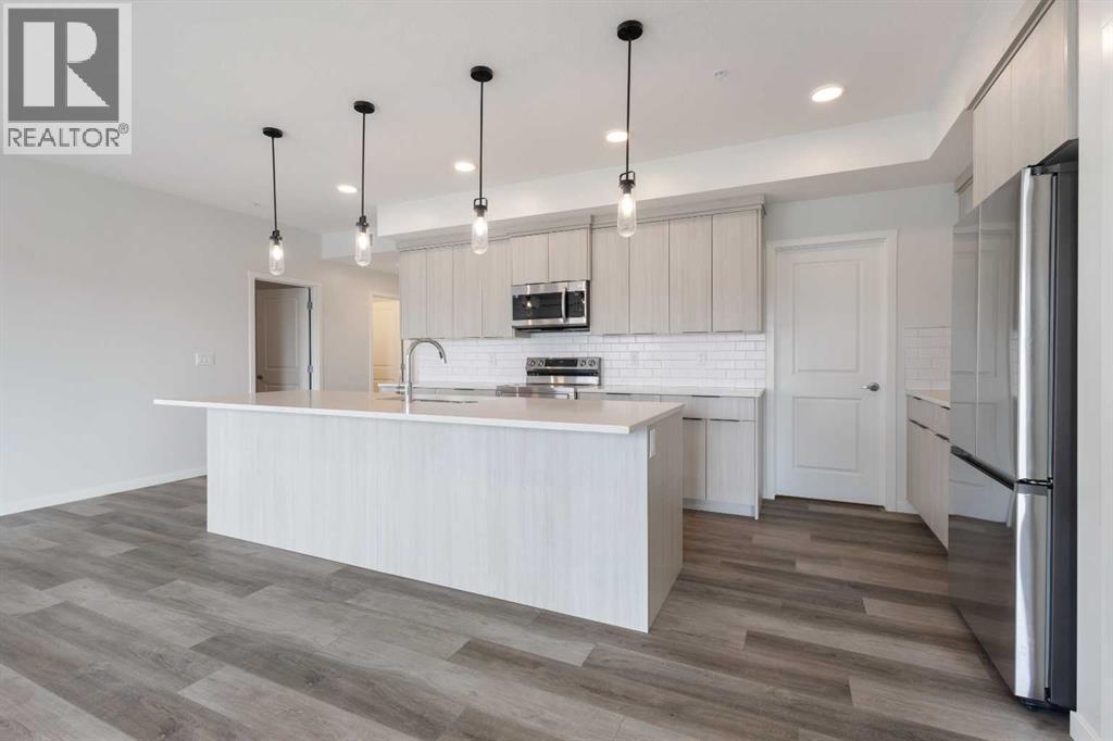 306, 360 Harvest Hills Way Ne, Calgary, Alberta T3K 2S1 - Photo 12 - A2253524