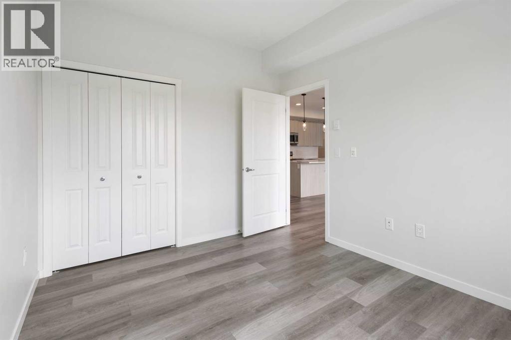 306, 360 Harvest Hills Way Ne, Calgary, Alberta T3K 2S1 - Photo 22 - A2253524