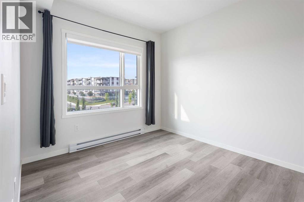 306, 360 Harvest Hills Way Ne, Calgary, Alberta T3K 2S1 - Photo 21 - A2253524