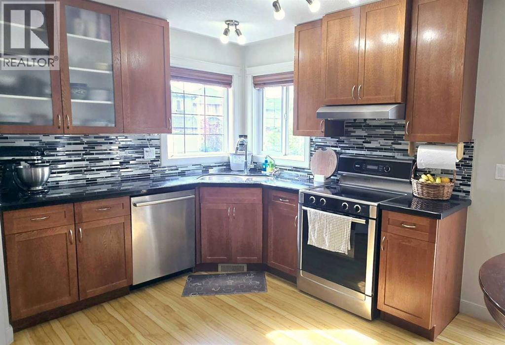 1156 Sherwood Boulevard Nw, Calgary, Alberta  T3R 1P3 - Photo 9 - A2236529