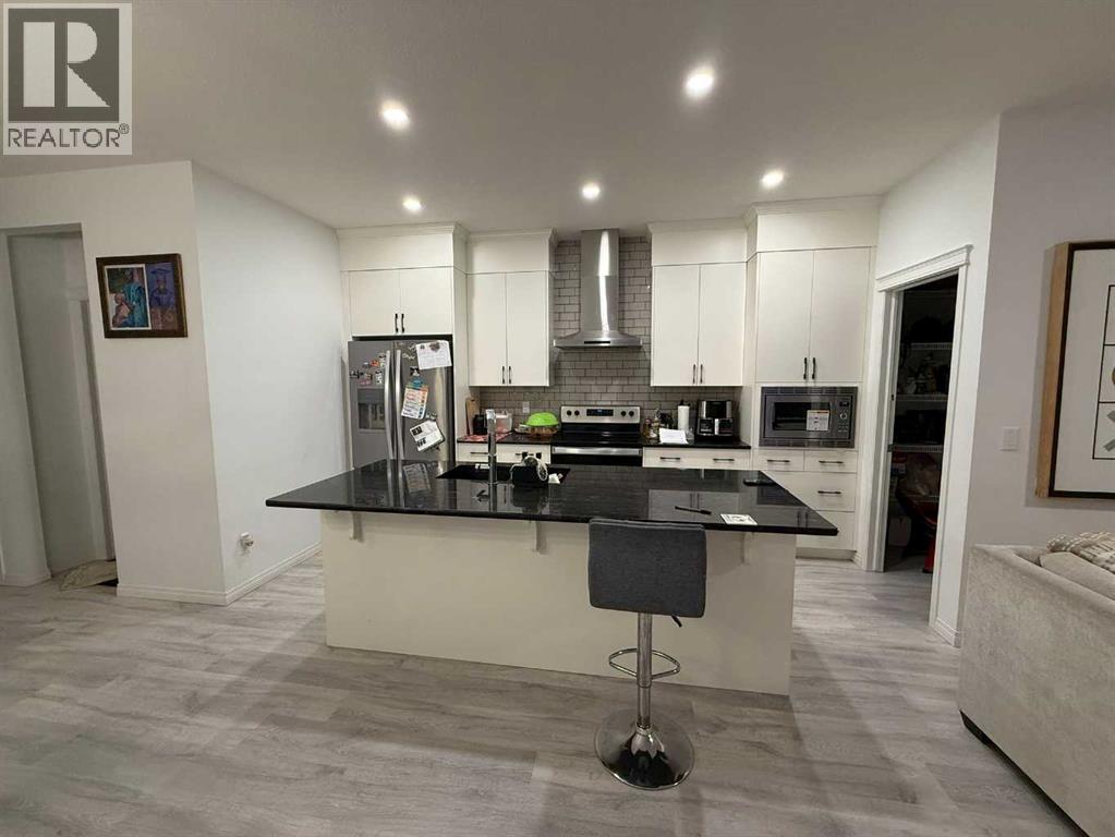 119 Edith Drive Nw, Calgary, Alberta  T3R 2B8 - Photo 11 - A2274427