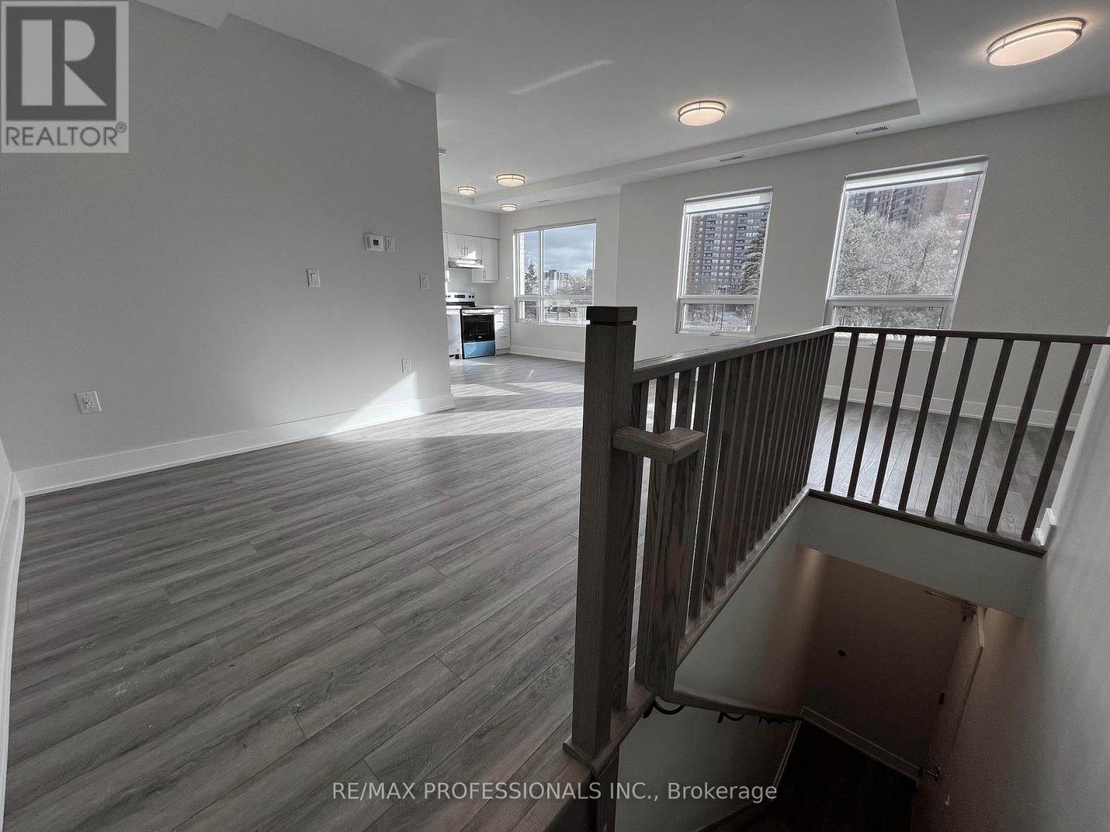 123 - 62 Dixfield Drive, Toronto, Ontario  M9C 3W1 - Photo 3 - W12614750