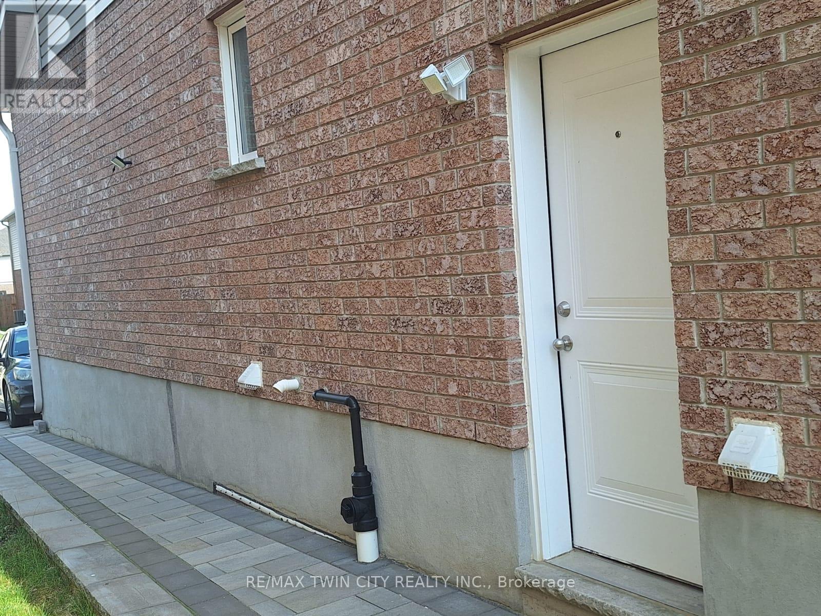 15 Spring Creek Street, Kitchener, Ontario  N2A 0G3 - Photo 3 - X12614738