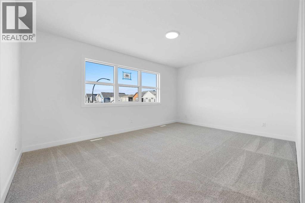 128 Mitchell Walk Nw, Calgary, Alberta T3R 2G2 - Photo 9 - A2272479