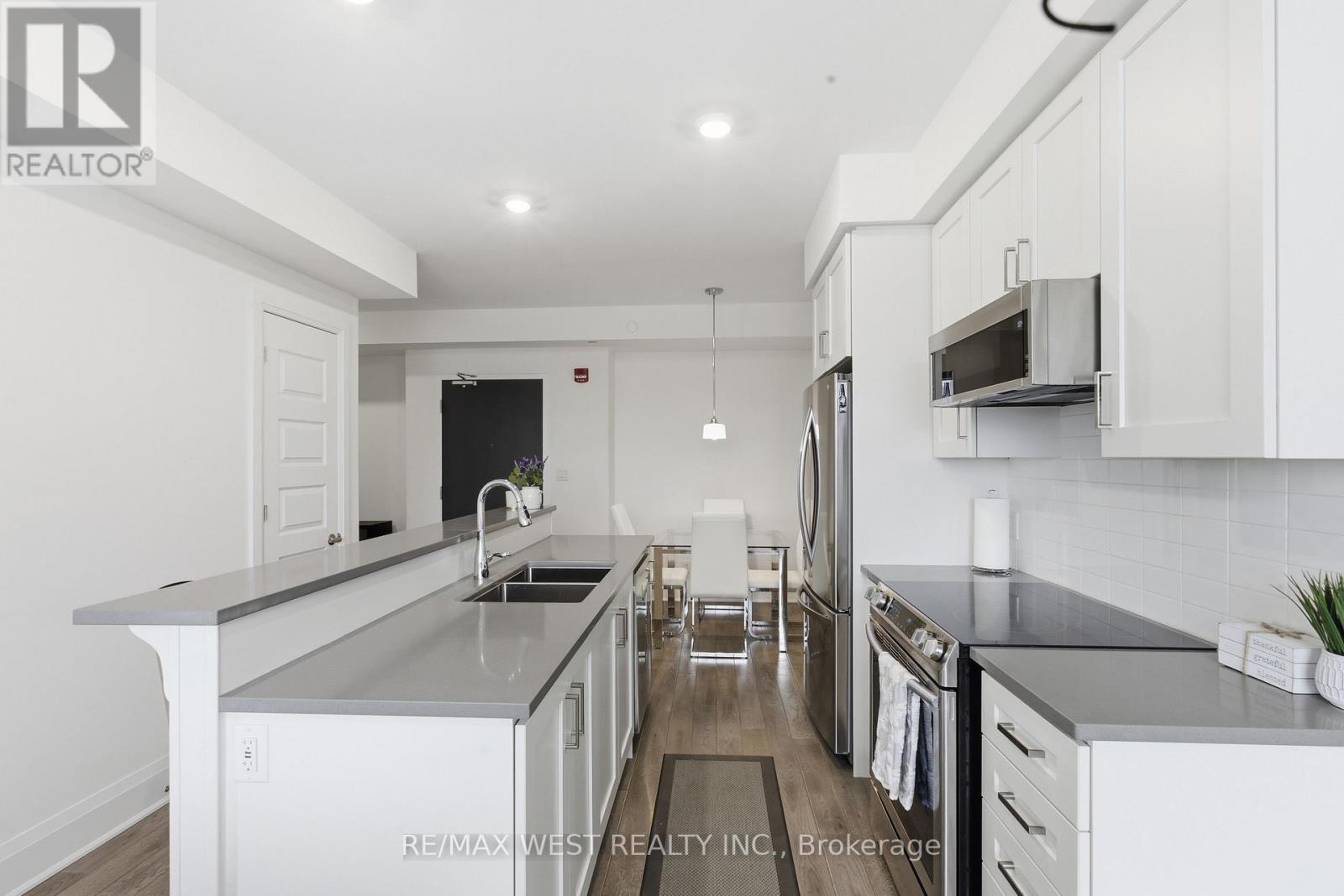 412 - 2 Adam Sellers Street, Markham, Ontario L6B 1P2 - Photo 7 - N12610856