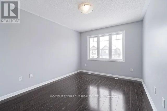 43 Colonel Frank Cheng Crescent, Brampton, Ontario  L6Y 5W4 - Photo 8 - W12573776