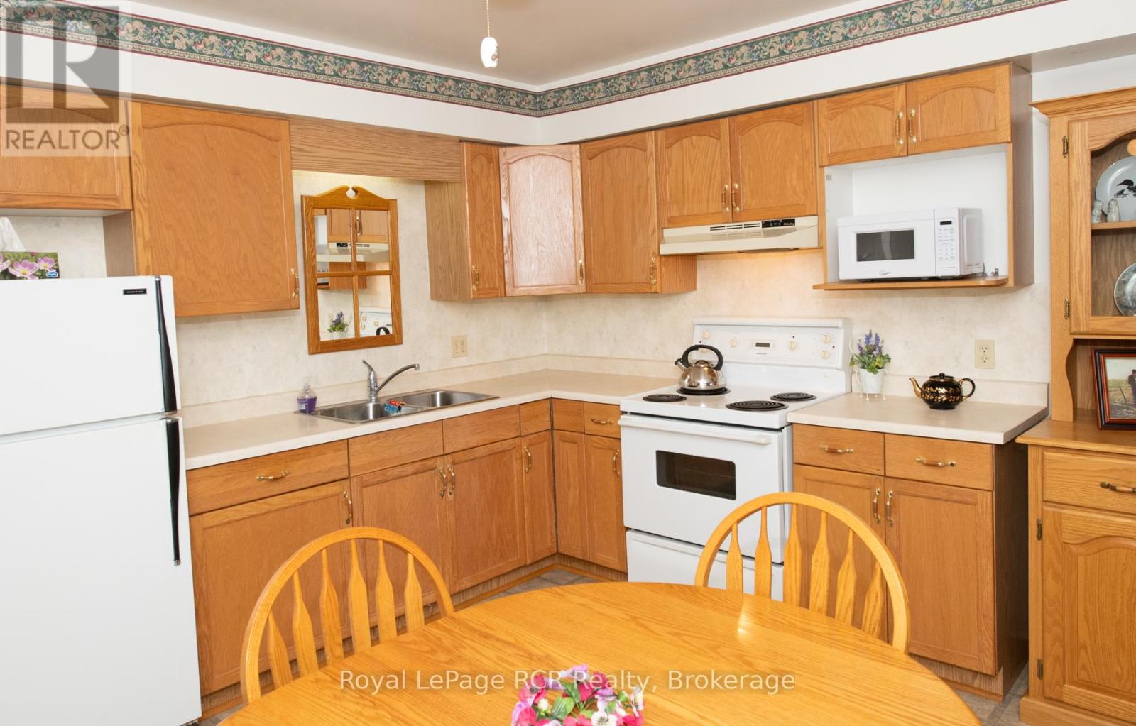 101 - 1-497 Birmingham St West Street W, Wellington North, Ontario N0G 2L1 - Photo 3 - X12096445