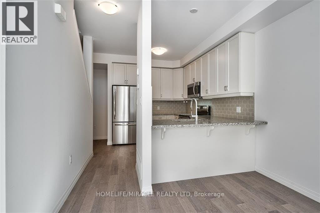 130 - 30 Times Square Boulevard, Hamilton, Ontario  L8J 0L8 - Photo 7 - X12615530