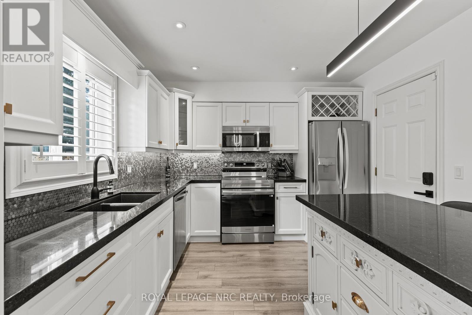 33 Broadway Avenue, St. Catharines (Port Weller), Ontario  L2M 1M3 - Photo 13 - X12615900