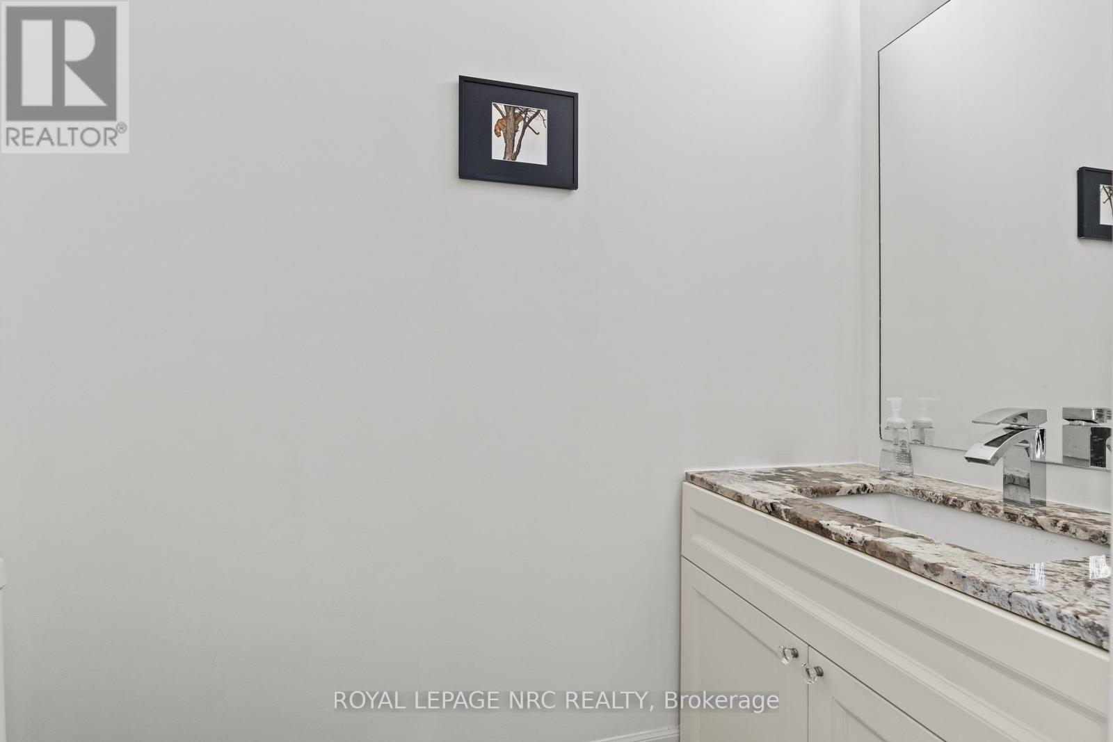 33 Broadway Avenue, St. Catharines (Port Weller), Ontario  L2M 1M3 - Photo 8 - X12615900