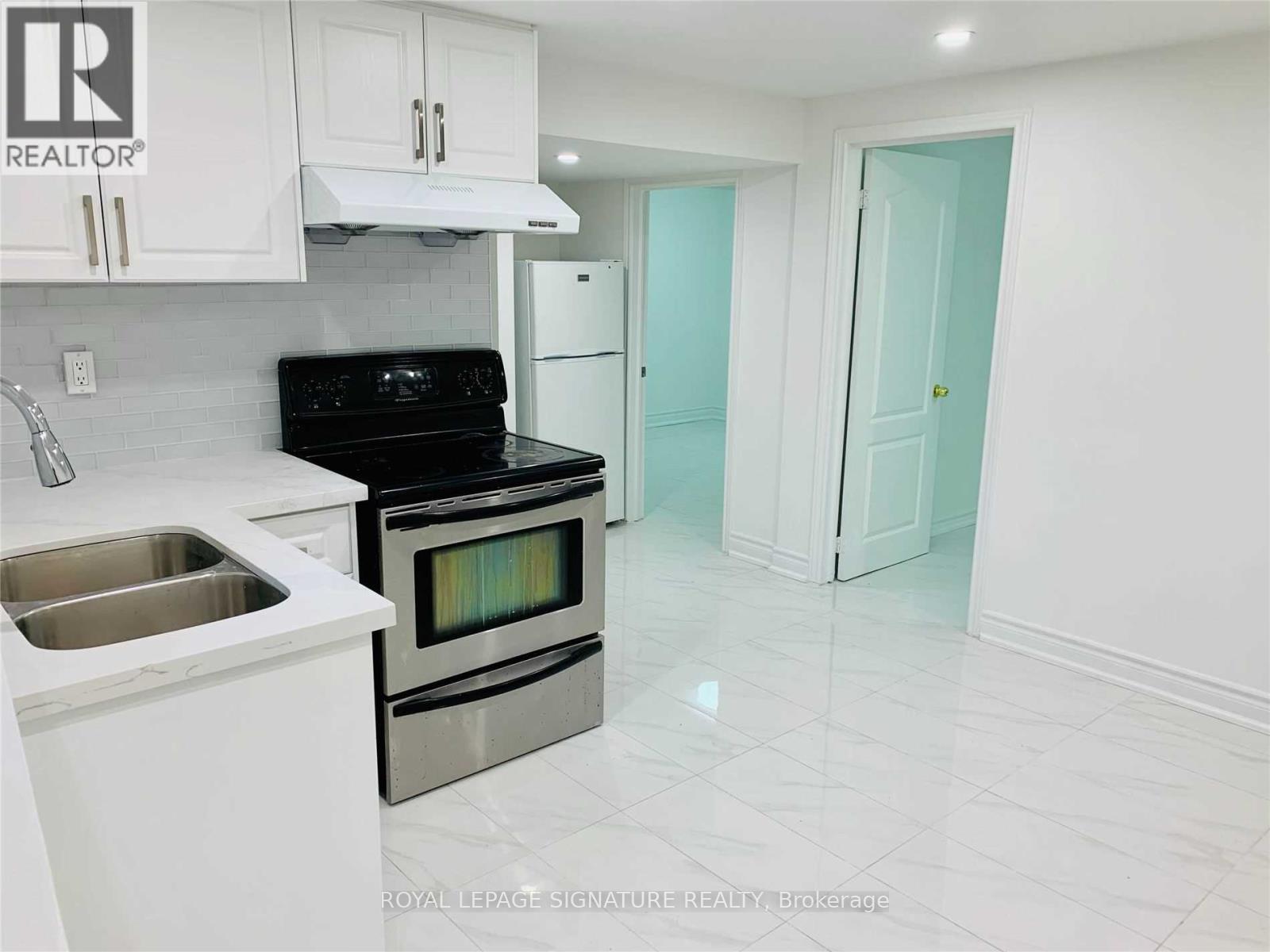 Lower - 23 Lynmont Road, Toronto, Ontario  M9V 3W7 - Photo 2 - W12615860