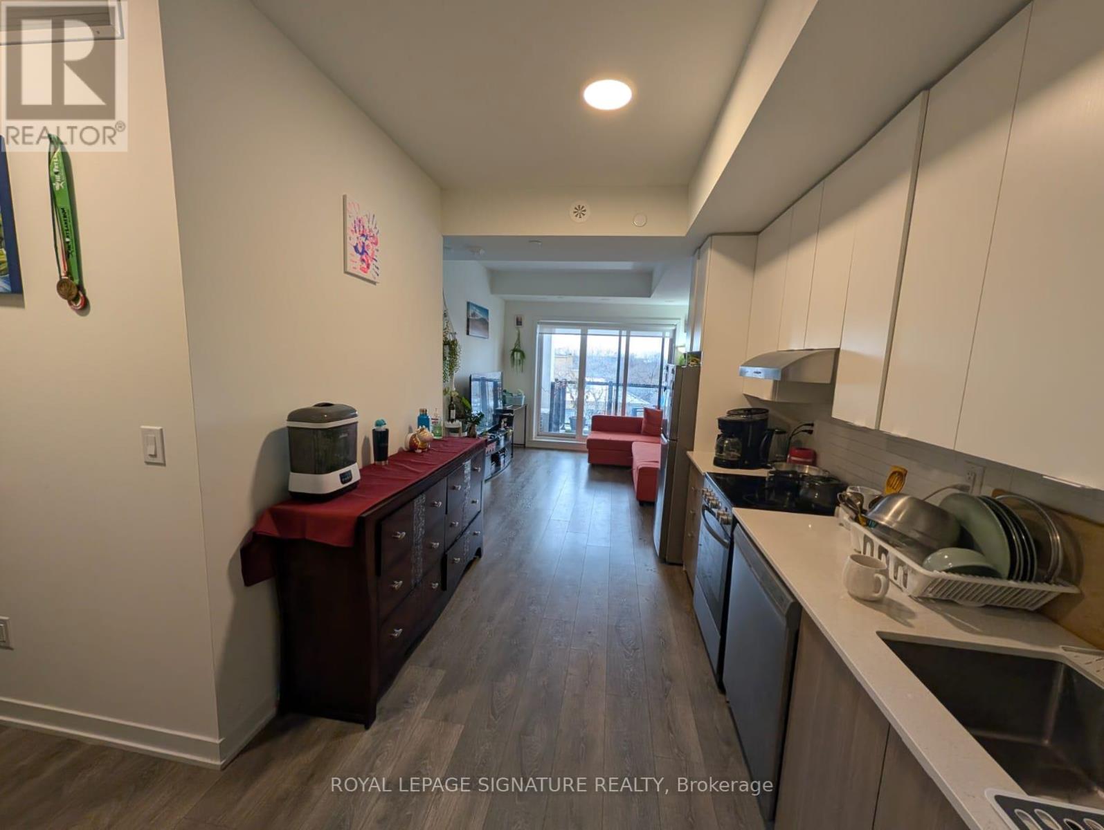 414 - 165 Canon Jackson Drive, Toronto (Beechborough-Greenbrook), Ontario  M6M 2G1 - Photo 4 - W12615290