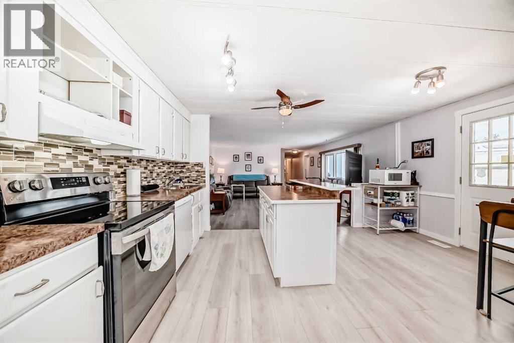 34 Burroughs Place Ne, Calgary, Alberta  T1Y 6K5 - Photo 4 - A2273044