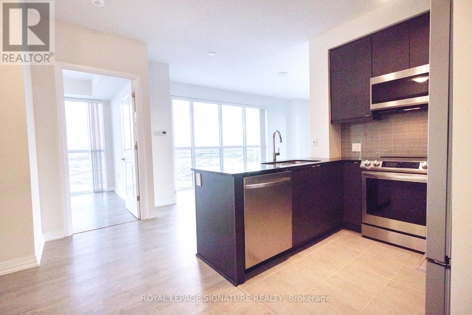 1404 - 50 Thomas Riley Road, Toronto, Ontario  M9B 0C5 - Photo 6 - W12616930