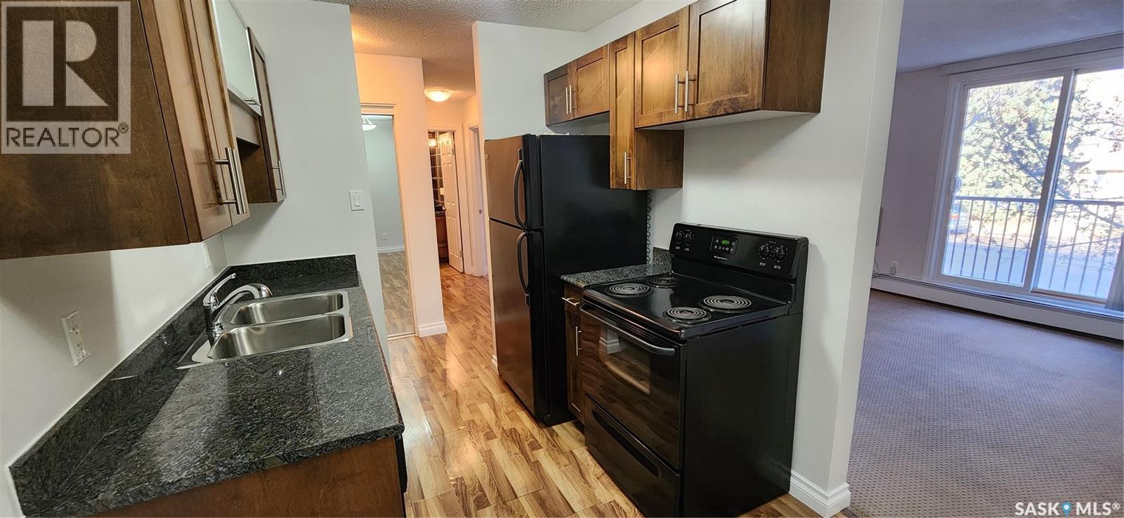 10 115 Acadia Drive, Saskatoon, Saskatchewan  S7H 4T8 - Photo 2 - SK023775