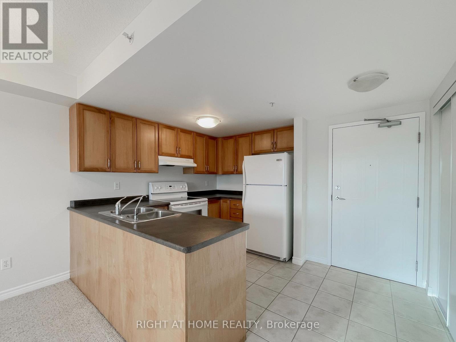 409 - 41 Goodwin Drive, Guelph, Ontario  N1L 0E7 - Photo 2 - X12617216