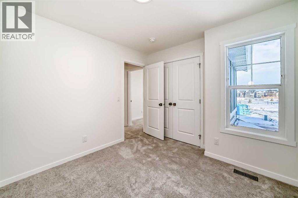 32 Southborough Common, Cochrane, Alberta T4C 3J7 - Photo 36 - A2273654