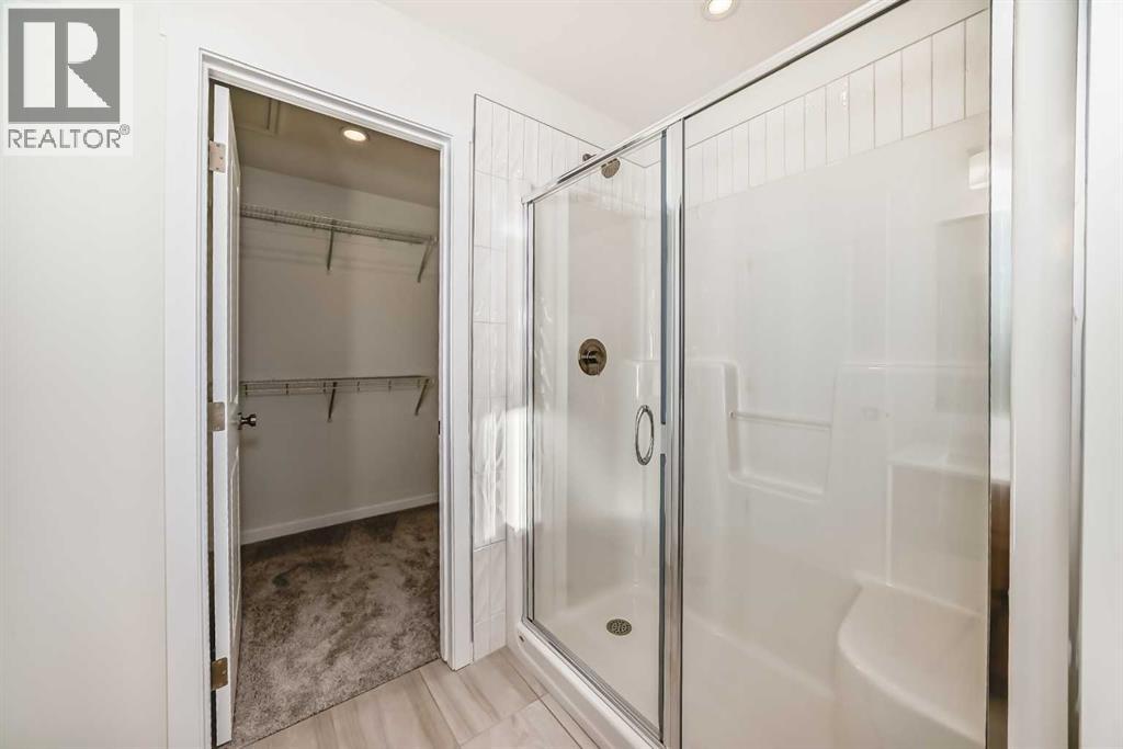 32 Southborough Common, Cochrane, Alberta T4C 3J7 - Photo 33 - A2273654