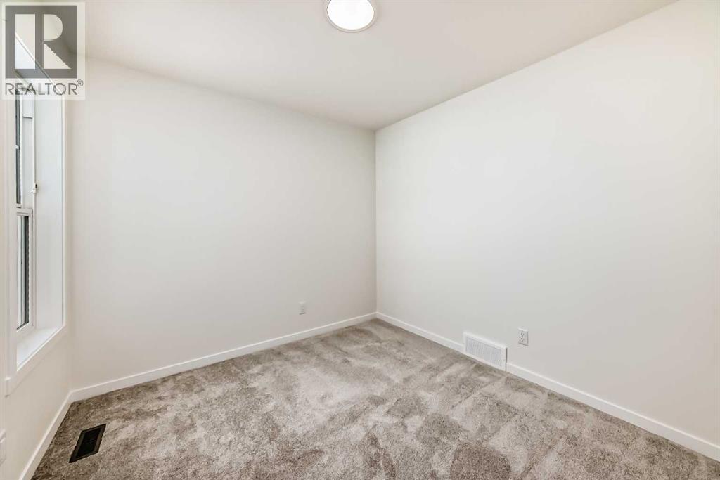 32 Southborough Common, Cochrane, Alberta T4C 3J7 - Photo 35 - A2273654