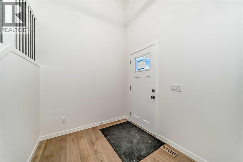 168 Southborough Common, Cochrane, Alberta  T4C 3J5 - Photo 3 - A2273060