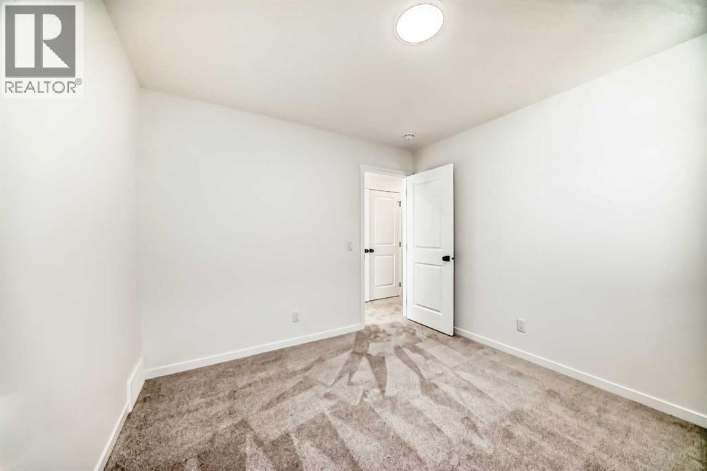 168 Southborough Common, Cochrane, Alberta  T4C 3J5 - Photo 37 - A2273060