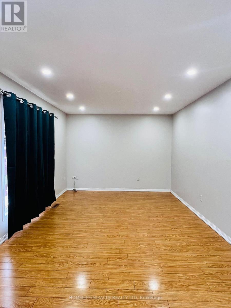 16 Marshmarigold Drive, Brampton, Ontario  L7A 2S9 - Photo 6 - W12617422