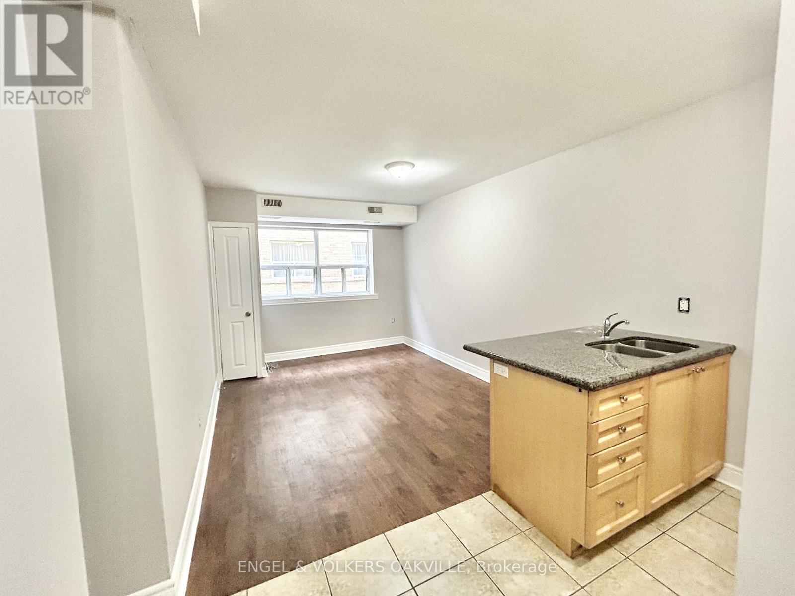 104 - 11 Thirty Third Street, Toronto, Ontario  M8W 3G7 - Photo 2 - W12604022