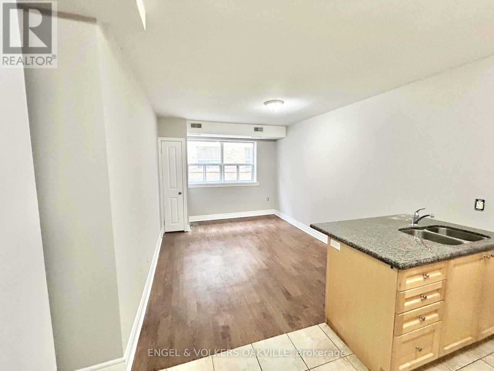 104 - 11 Thirty Third Street, Toronto, Ontario  M8W 3G7 - Photo 4 - W12604022