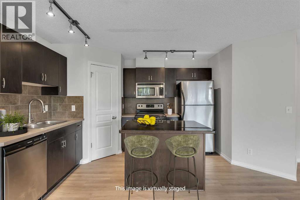 57 Auburn Bay Common Se, Calgary, Alberta T3M 0M6 - Photo 3 - A2240452