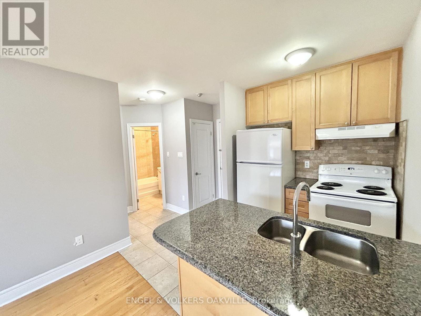 303 - 11 Thirty Third Street, Toronto, Ontario  M8W 3G7 - Photo 4 - W12604024