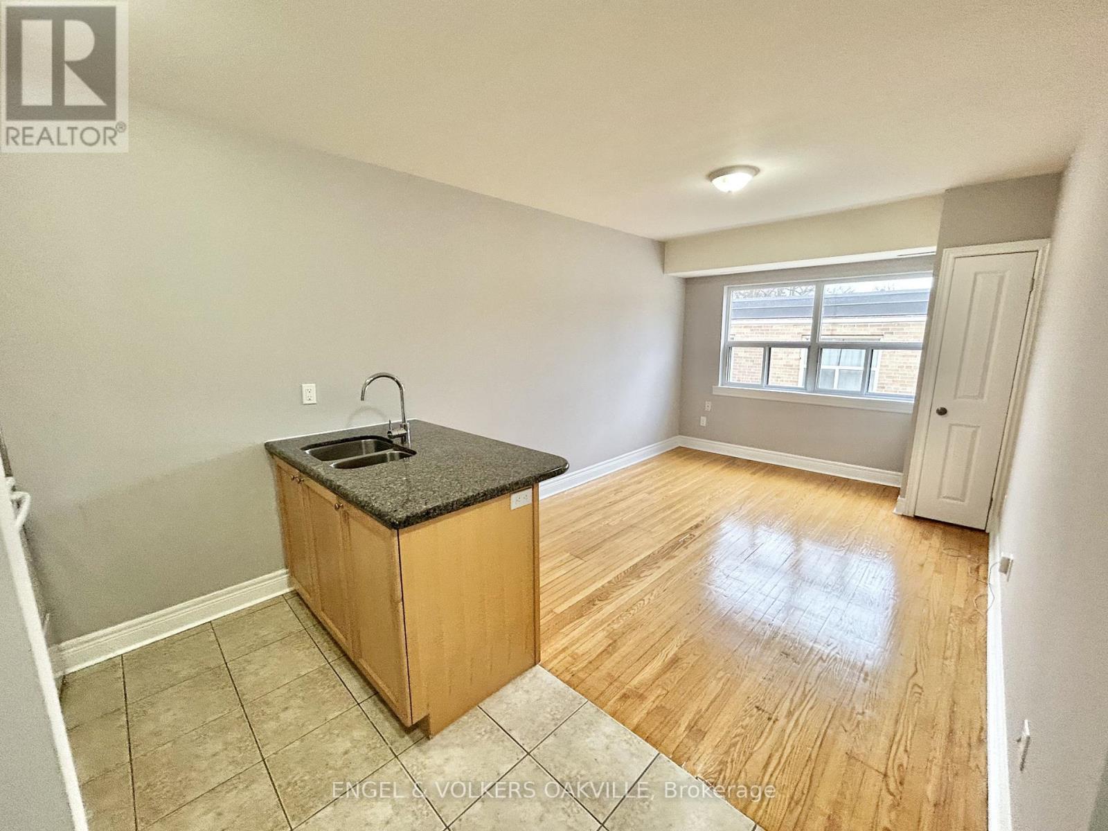 303 - 11 Thirty Third Street, Toronto, Ontario  M8W 3G7 - Photo 2 - W12604024