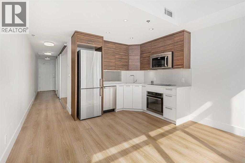 310, 1087 2 Avenue Nw, Calgary, Alberta  T3H 5L9 - Photo 6 - A2261171