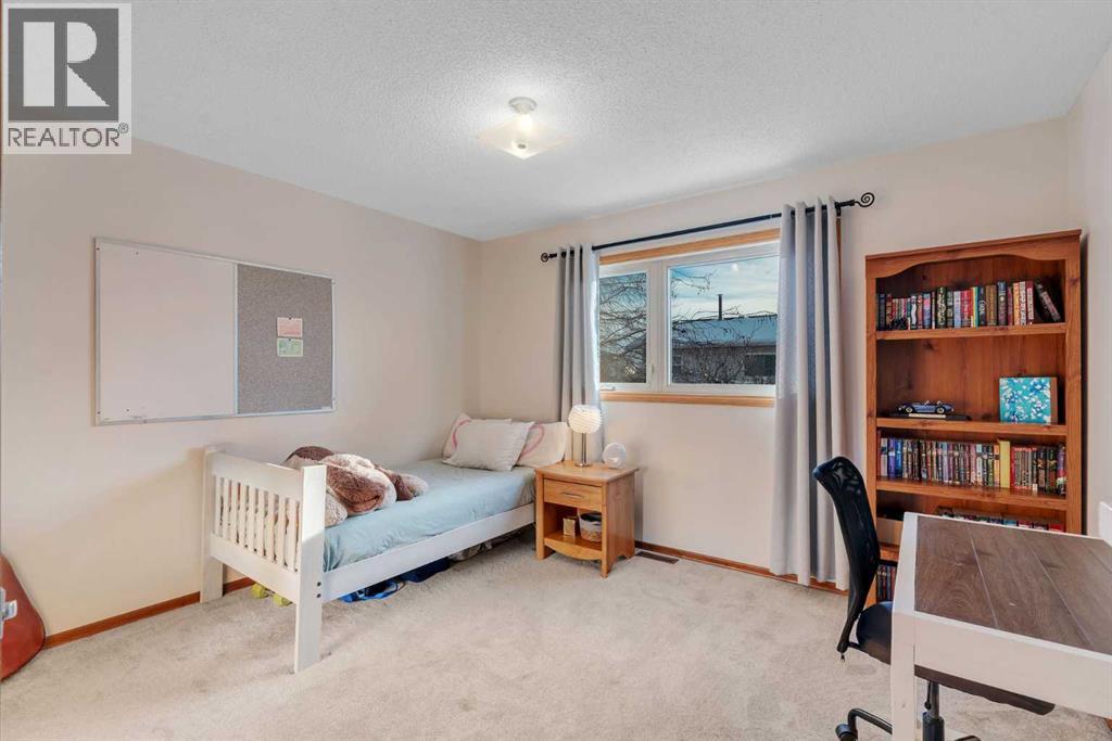 244 Ranchridge Court Nw, Calgary, Alberta  T3G 1W5 - Photo 21 - A2273569
