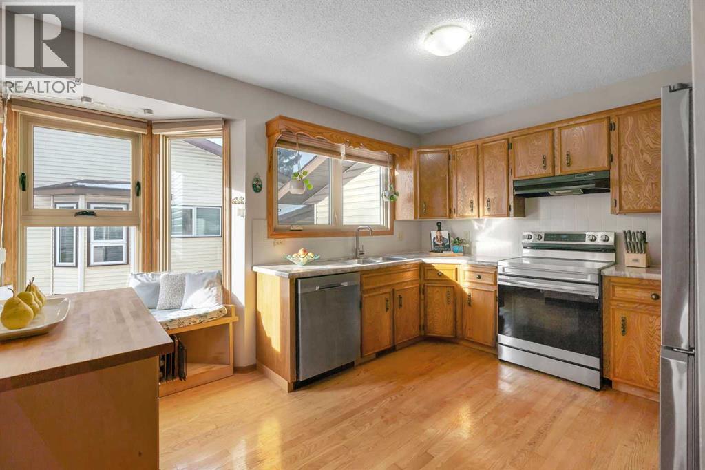 244 Ranchridge Court Nw, Calgary, Alberta  T3G 1W5 - Photo 9 - A2273569