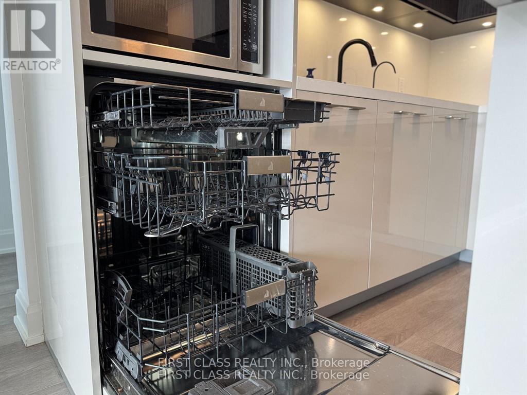 707 - 8 Water Walk Drive, Markham, Ontario  L3R 6L4 - Photo 9 - N12621416