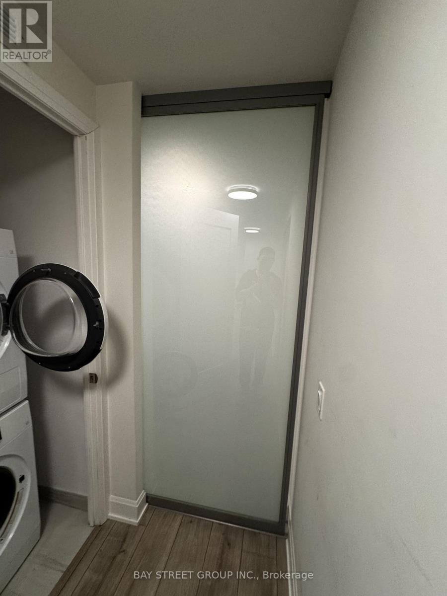 709 - 38 Water Walk Drive, Markham, Ontario  L3R 6M8 - Photo 20 - N12621444