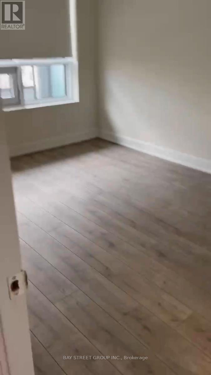 709 - 38 Water Walk Drive, Markham, Ontario  L3R 6M8 - Photo 5 - N12621444