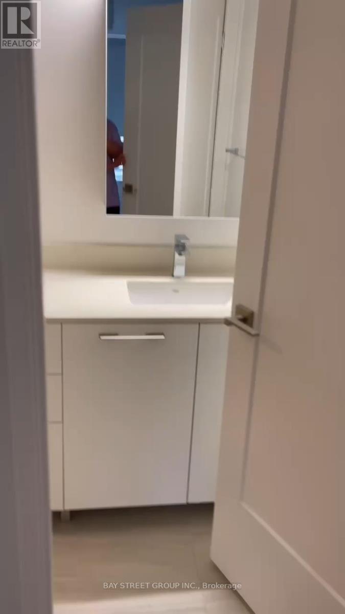 709 - 38 Water Walk Drive, Markham, Ontario  L3R 6M8 - Photo 6 - N12621444