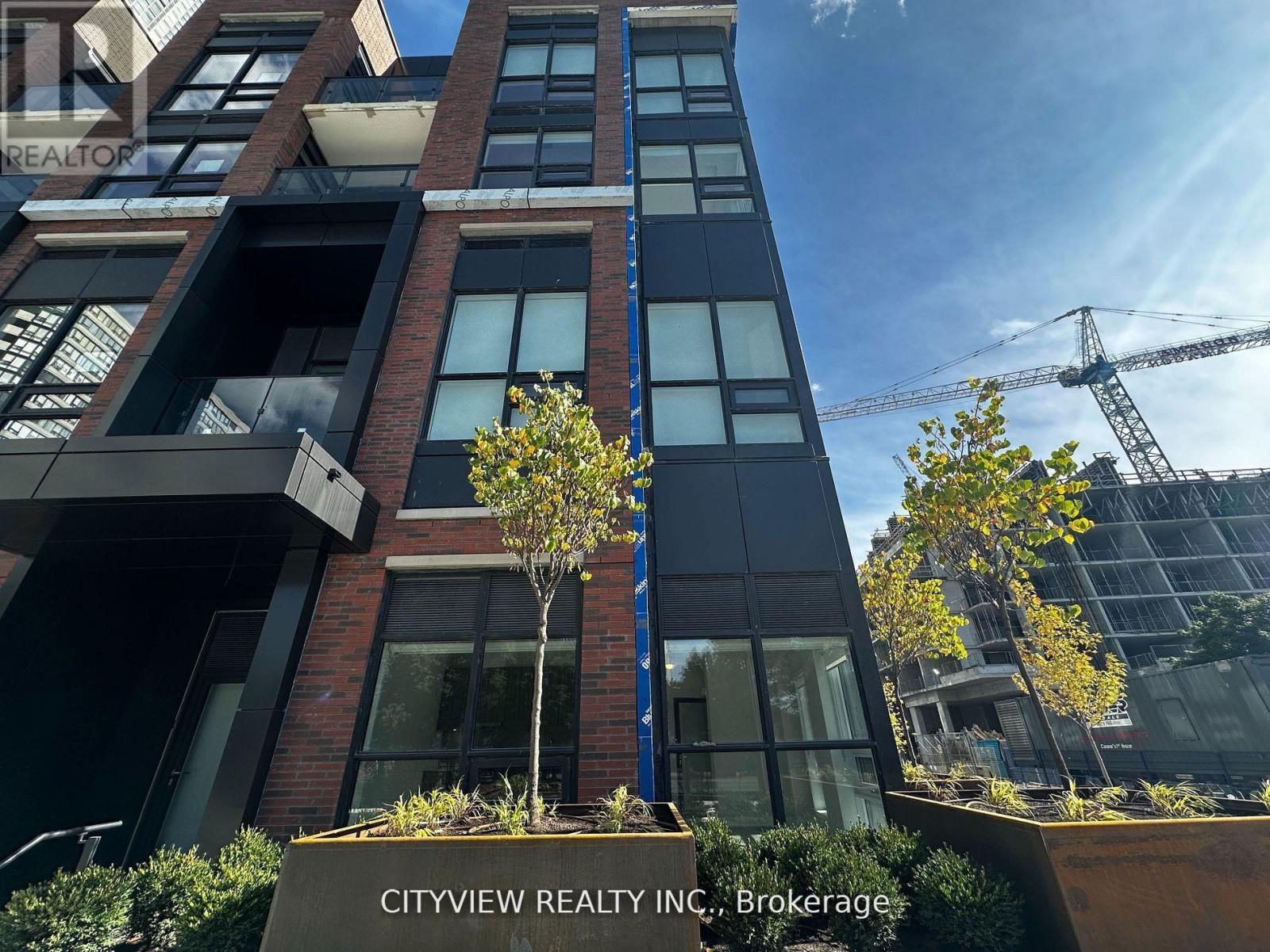 105 - 4130 Parkside Village Drive, Mississauga, Ontario  L5B 3M8 - Photo 2 - W12621500