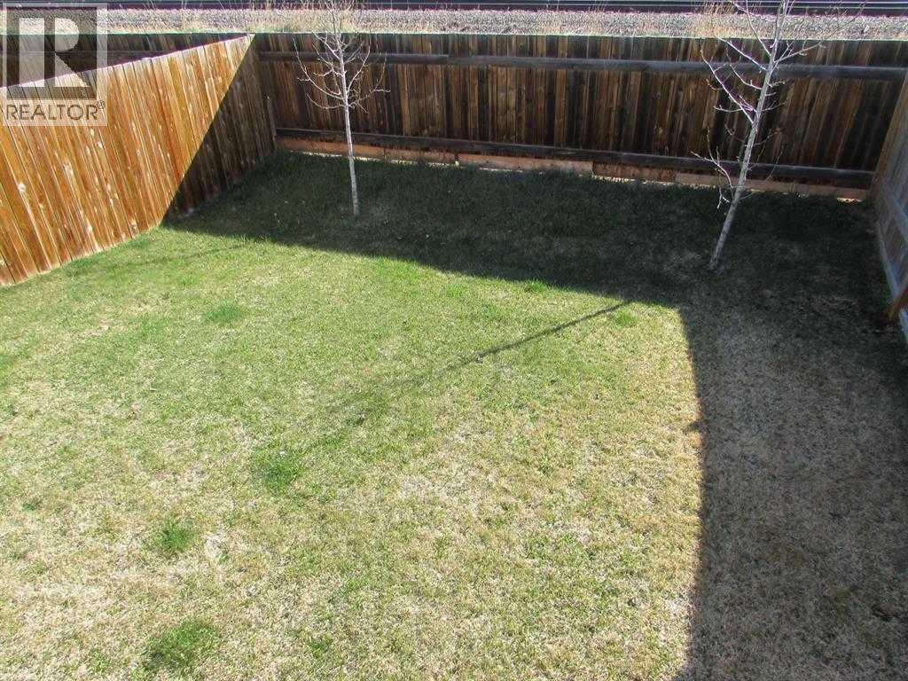 742 Carriage Lane Drive, Carstairs, Alberta T0M 0N0 - Photo 3 - A2264849